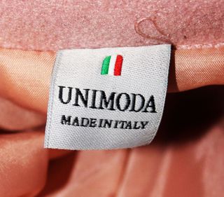 Abrigo rosa con cuello de pelo