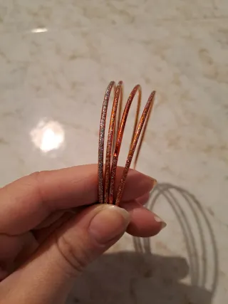 Set bracciali arancione e argento