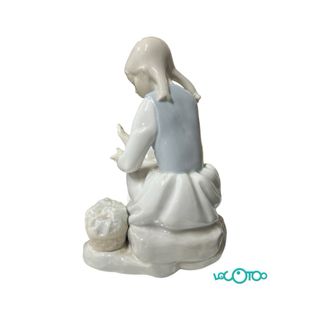 FIGURA NAO NIÑA DESCANSANDO