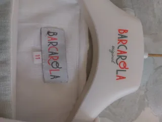 Traje de comunión de niño blanco y verde agua