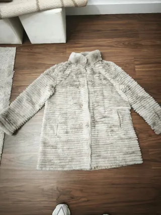 Parka elegante de pelo para señora