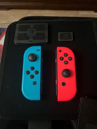 Nintendo Switch + Accesorios y Juegos