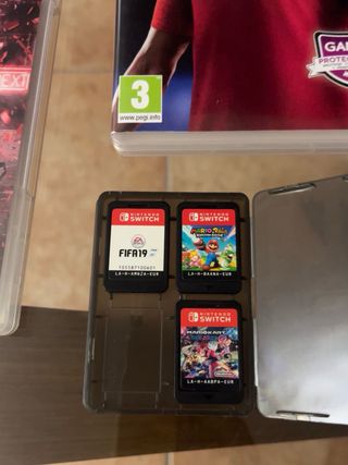Nintendo Switch + Accesorios y Juegos