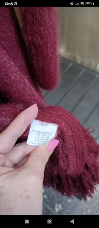 Chaqueta punto flecos moda