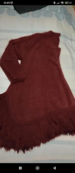 Chaqueta punto flecos moda