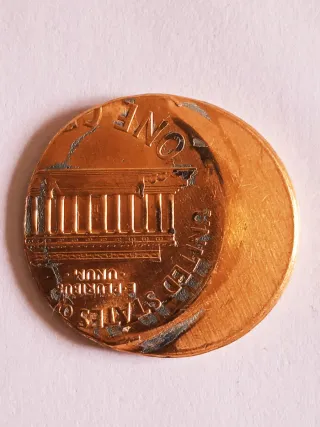 MONEDA 1 CENTAVO LINCOLN.ERROR MUY DESCENTRADA.