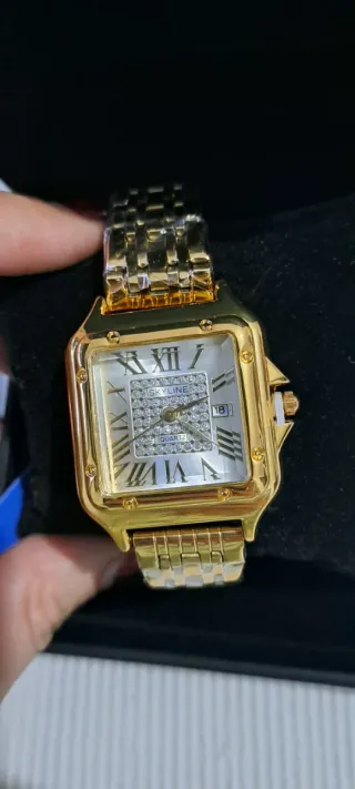 Reloj SKYLINE Dorado y Plateado