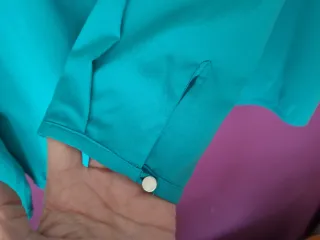 Blusa verde azulado con cremallera