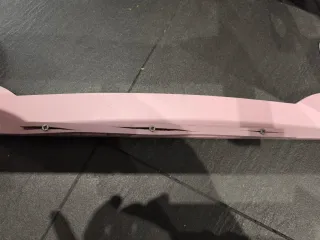 Cuna litera de juguete rosa y blanca