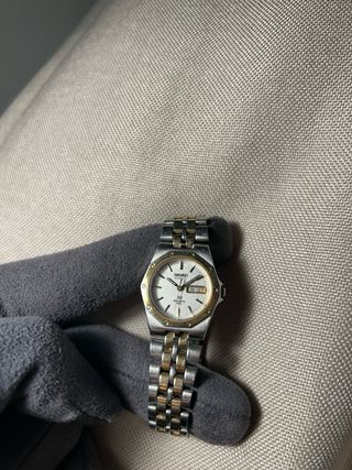 Reloj Seiko Dorado y Plateado