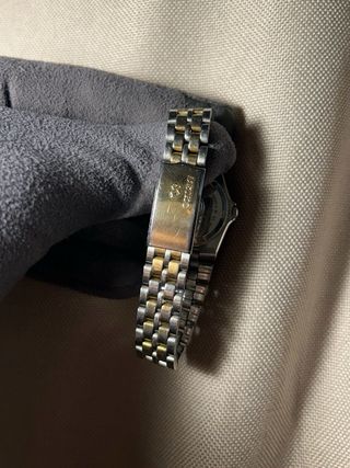 Reloj Seiko Dorado y Plateado