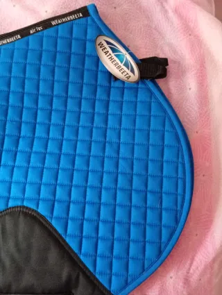 Mantilla equitación azul salto