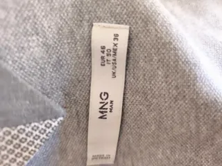 Americana niño gris.