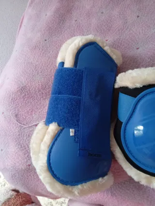 Protectores de equitación azules