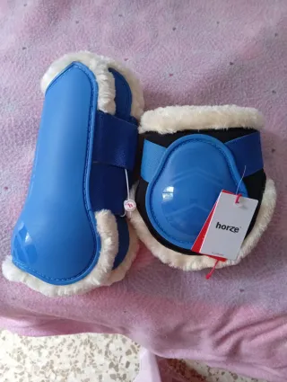 Protectores de equitación azules