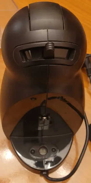 Cafetera Nescafé Dolce Gusto Negra y Soporte caps.