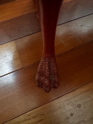 Mesa de centro ovalada de madera y mármol