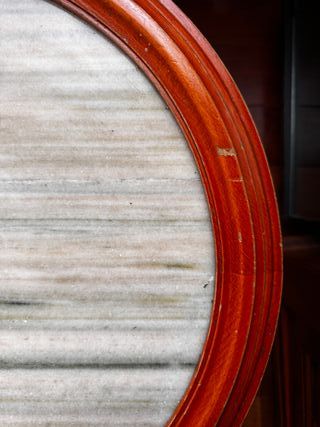 Mesa de centro ovalada de madera y mármol