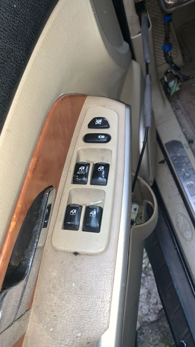 Botonera Elevalunas SsangYong Rexton Del. Izq.