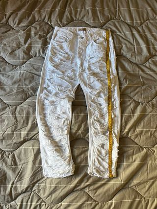 Jeans bianchi strappati