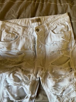 Jeans bianchi strappati