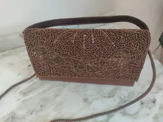 Pochette bronzo con perline