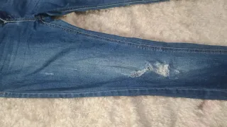 Vaqueros Stradivarius desgastados con cremallera