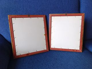 Coppia stampe artistiche con cornice dorata