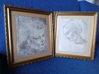 Coppia stampe artistiche con cornice dorata