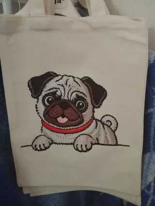 Sacos de lona com bordado de cão