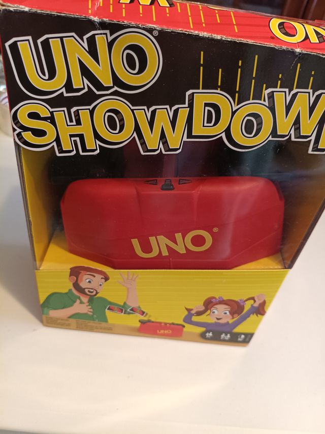 Juego Uno Showdown con instrucciones