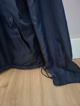 Chaqueta polar reversible negra y beige