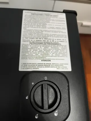 Estufa de gas negra. Hay que arreglarla .