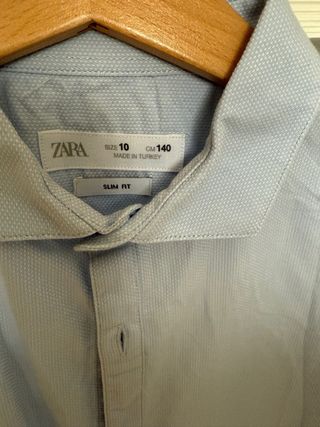 Traje chaqueta azul y 2 camisas niño 10-11 años