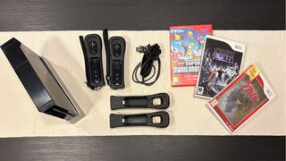 Nintendo Wii Negra + 2 Mandos + 3 Juegos