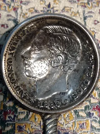 Cucharilla antigua con retrato de Alfonso xll