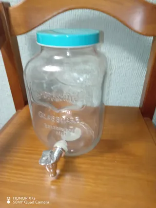Jarrones de cristal .Y dispensador de liquidos
