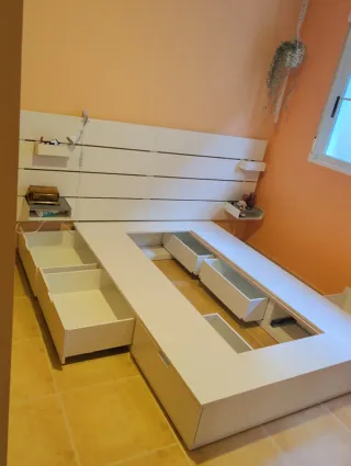 Cama NORDLI IKEA con cajones, cabecero, mesitas