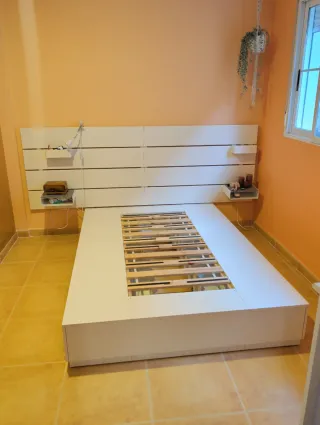 Cama NORDLI IKEA con cajones, cabecero, mesitas