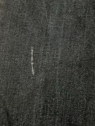 Pantalón vaquero negro L con pedrería.