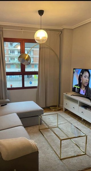 Mesa de centro cristal y metal dorado