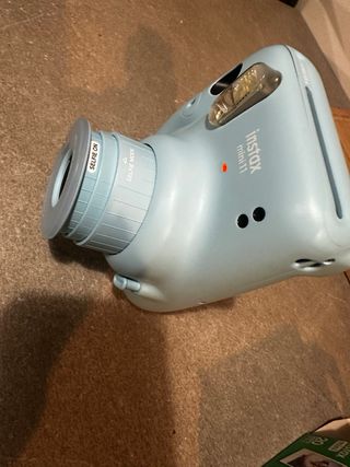 Cámara Instax Mini 11 + Pack 10 Fotos