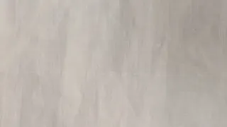 Sábana antigua bordada y castañuelas.