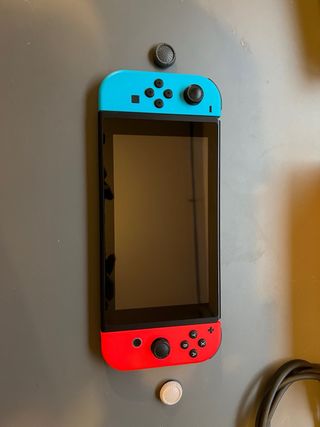 Nintendo Switch + Mario Bros U Deluxe