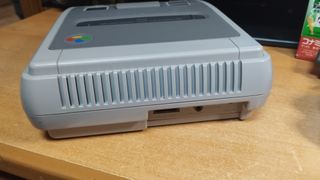 Super Famicom con 2 mandos y juego