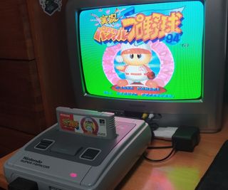 Super Famicom con 2 mandos y juego