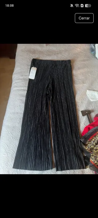 Pantalones negros plisados sin estrenar con etique
