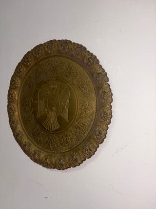 Piatto in ottone con aquila bicipite