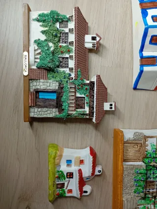 Casas de cerámica para pared