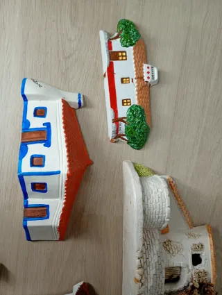 Casas de cerámica para pared
